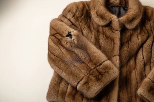 natural fur jacket with tear in the sleeve