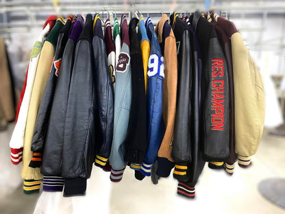 A rack of varsity jackets cleaned at leathercareusa.com